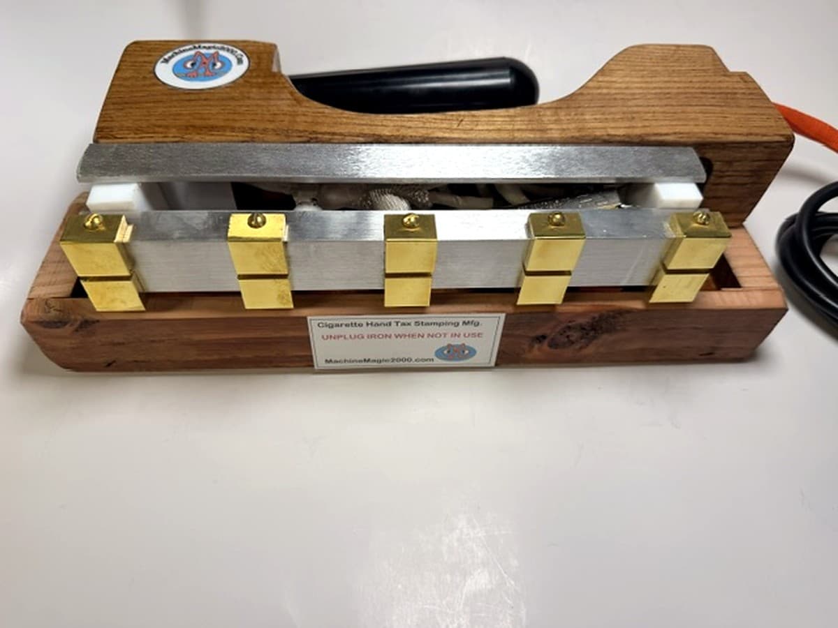 MM 10DLX Deluxe 2x5 ten stamp iron with polished brass pads in its wooden stand
